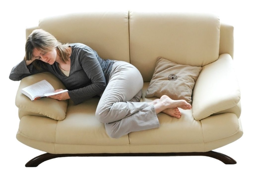 Woman reading on a sofa