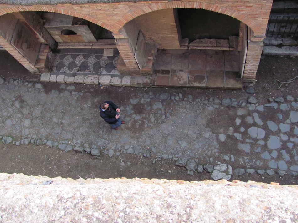 Looking down to street bar, Pompeii